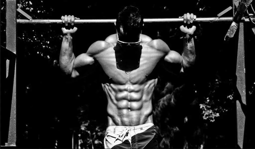 An athlete considering muscle recovery and training frequency for optimal results.