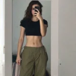 Casual crop top outfits with stylish sweatpants for a trendy look.