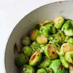 A variety of high-protein vegetables including peas, spinach, and broccoli.